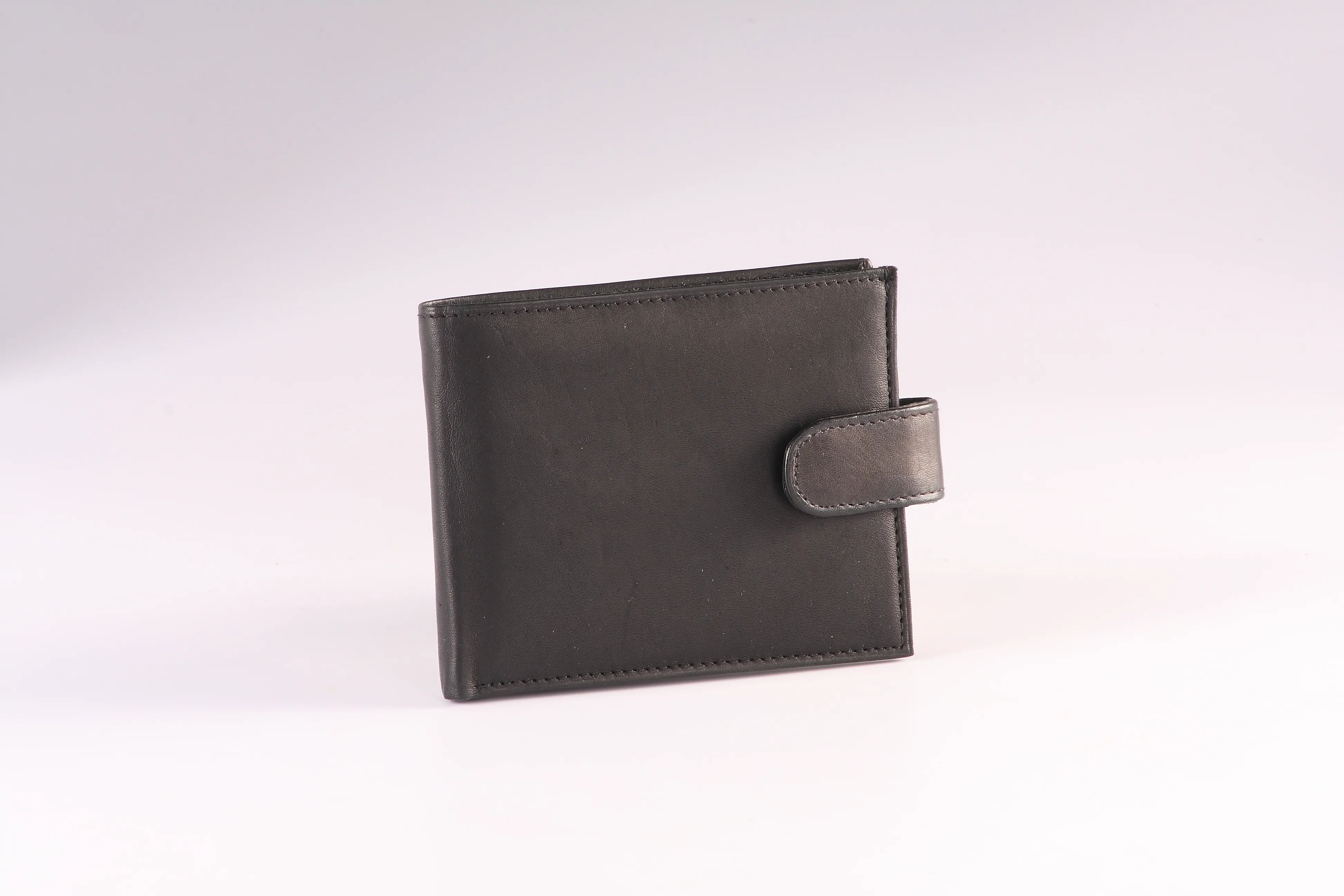 Black Genuine Leather Wallet with Tab Closure, 3 Card Cases, Coin Pocket, and 2 Currency Compartments.