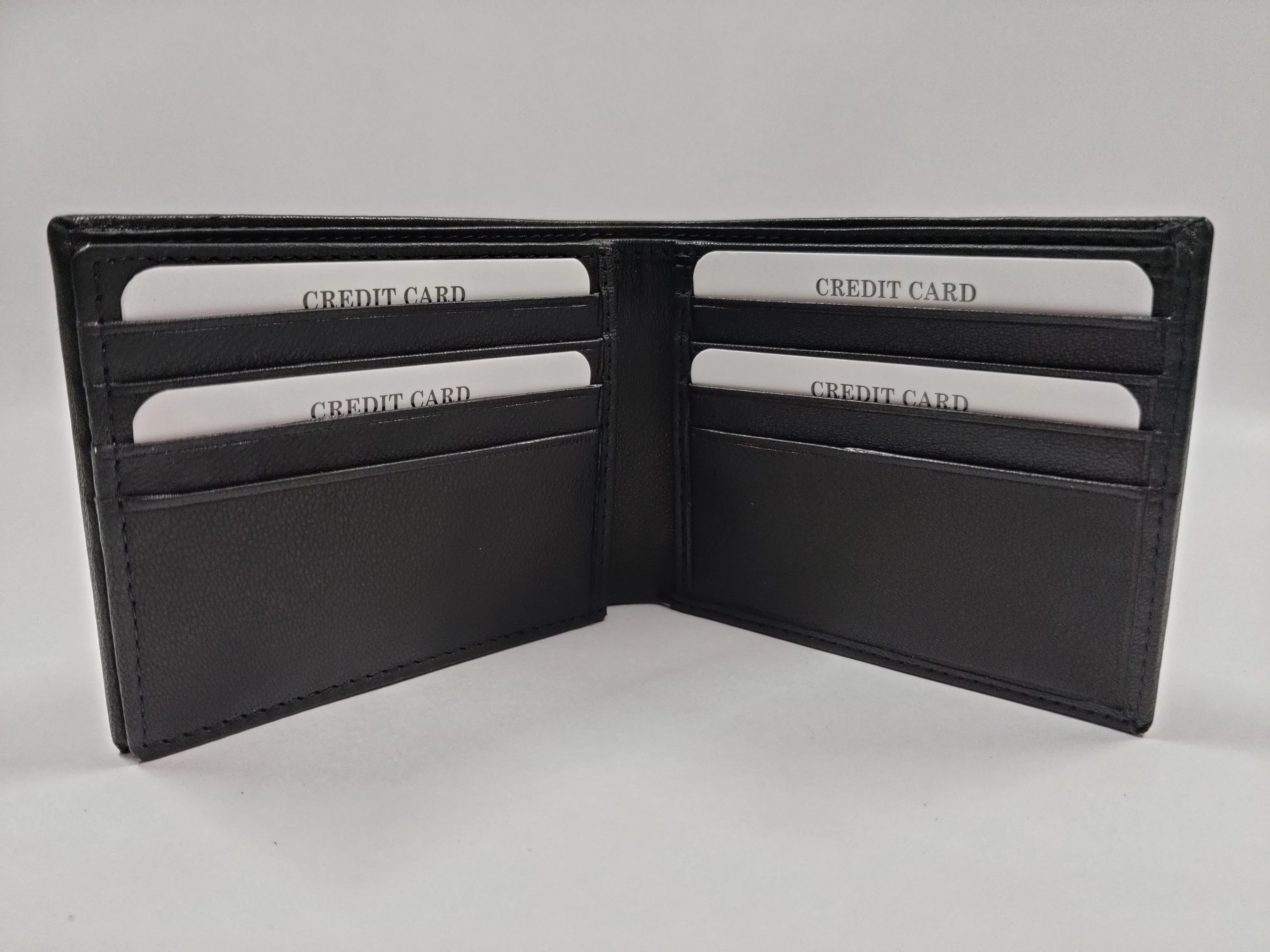 Genuine black goat Nappa leather bifold wallet with horizontal flap, 12 credit card slots, ID window, zippered note compartment, and multiple compartments.