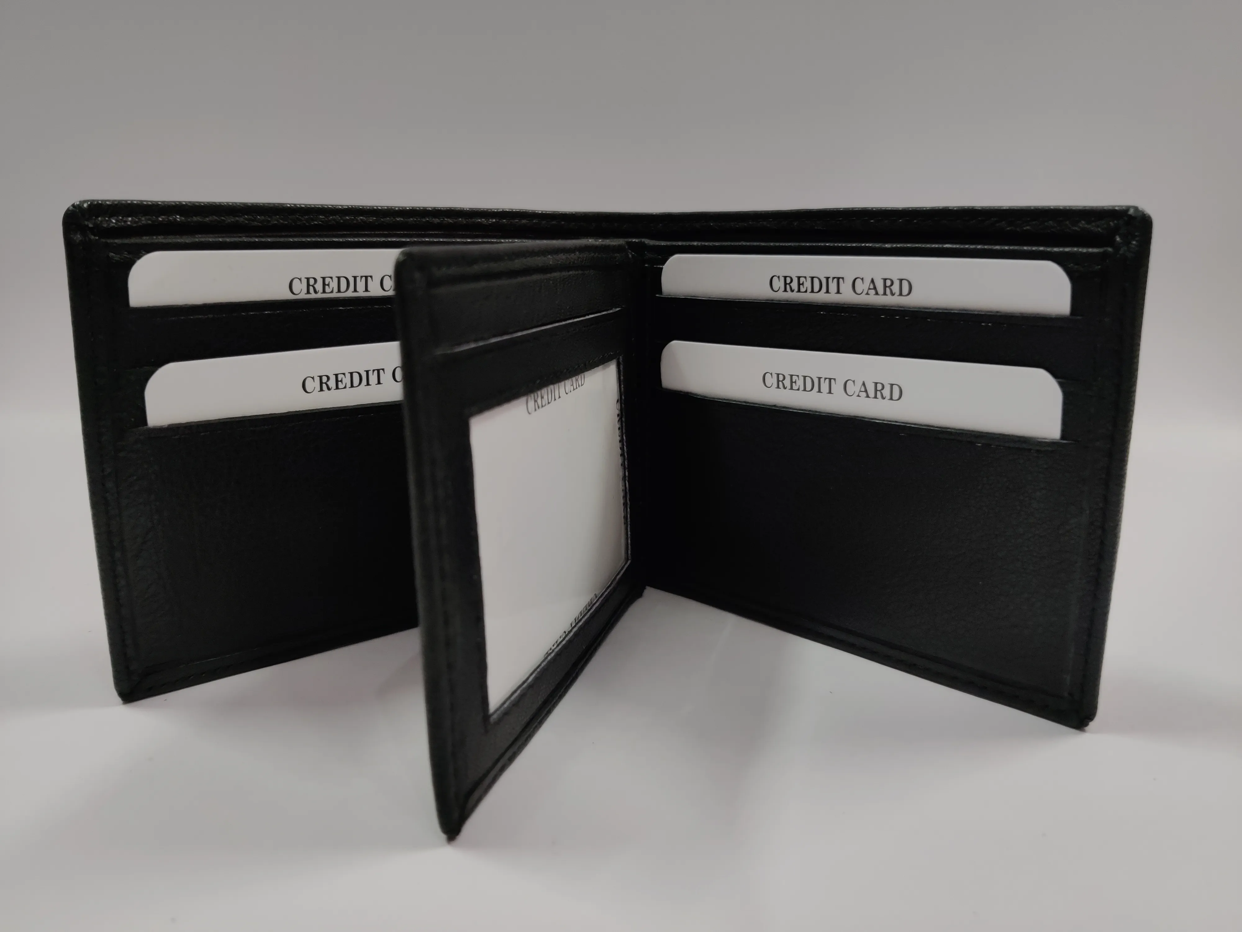 Genuine black goat Nappa leather bifold wallet with horizontal flap, 9 credit card slots, ID window, secret compartments, and dual currency storage.